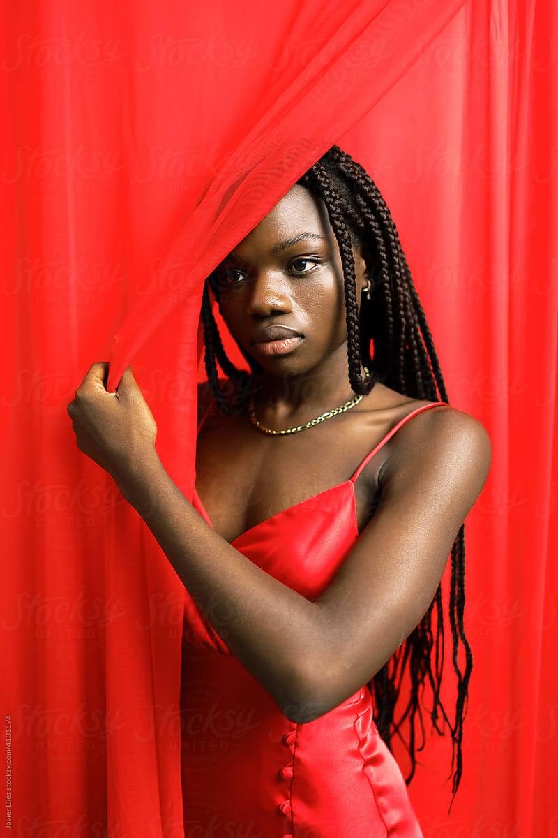 Elegant black woman in red gown