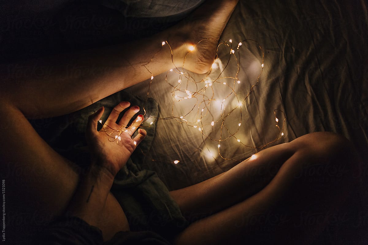 hand and legs with fairy lights