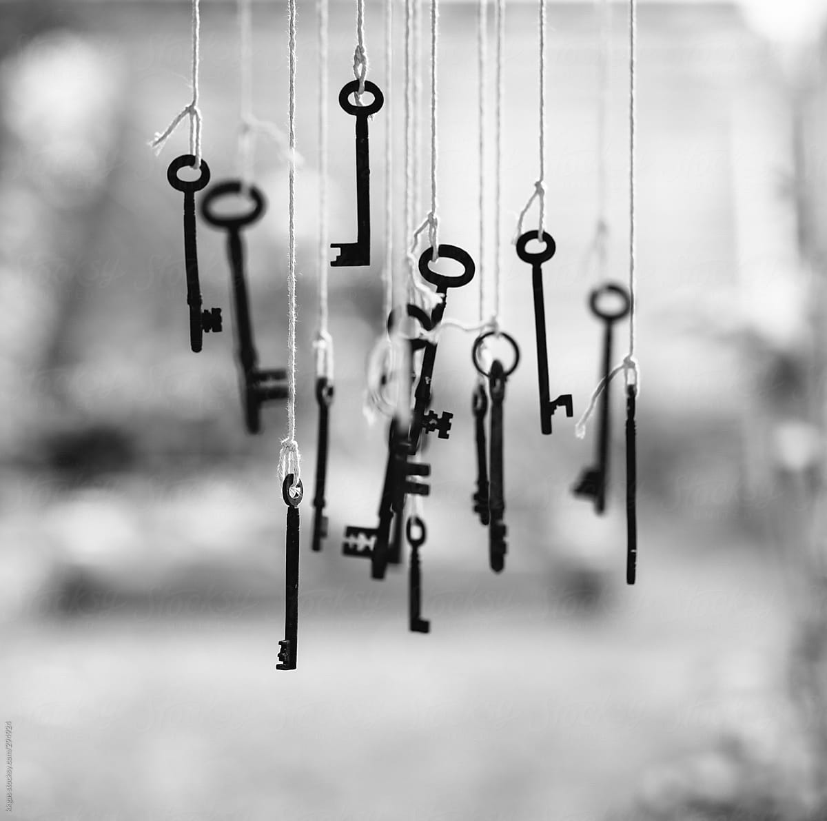 Antique keys hanging outdoors.