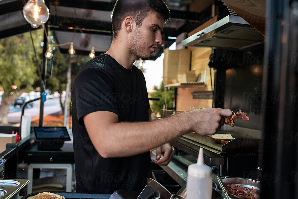 Chef cooking in a small business food truck