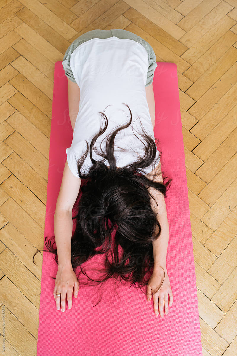 Anonymous woman doing yoga
