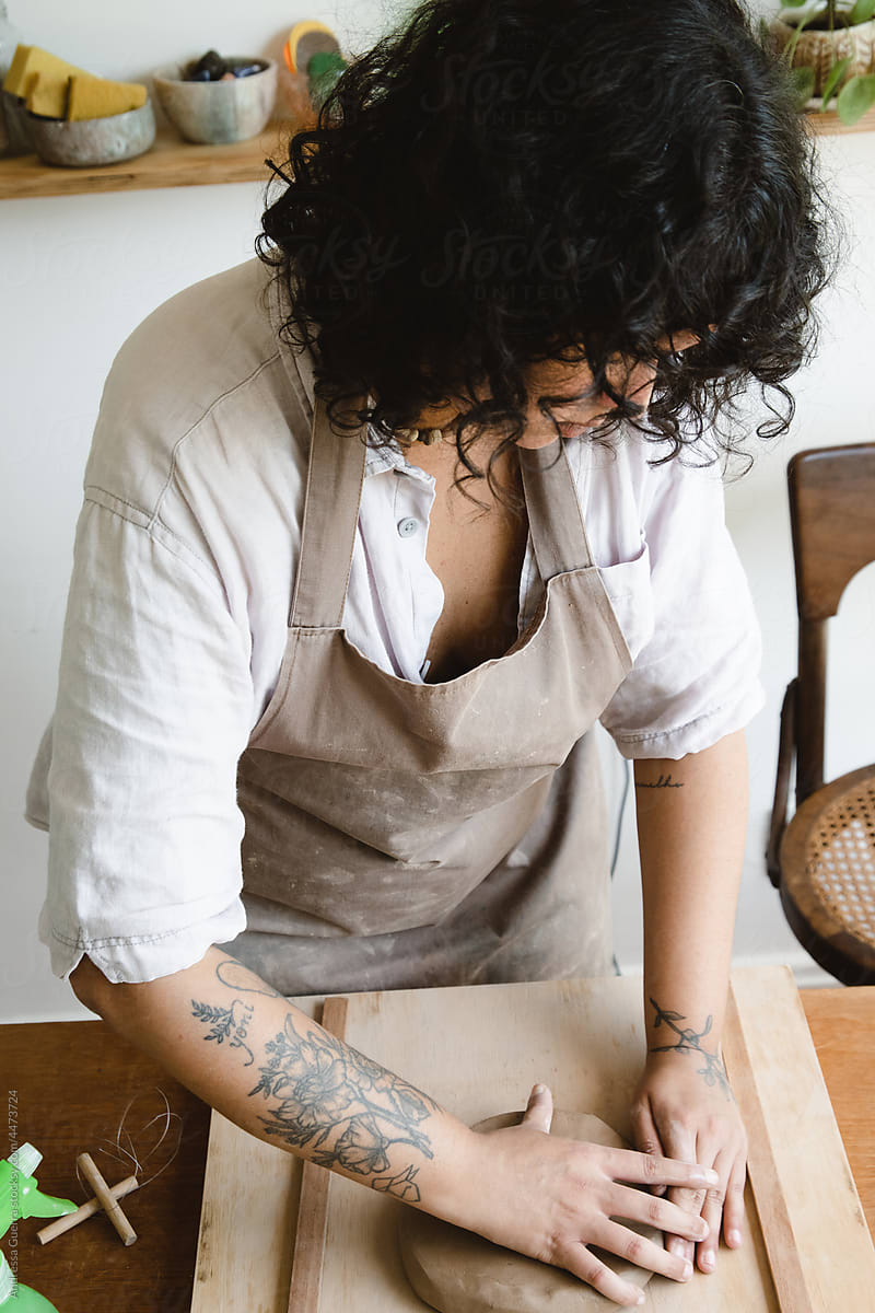 Woman making a ceramic dish