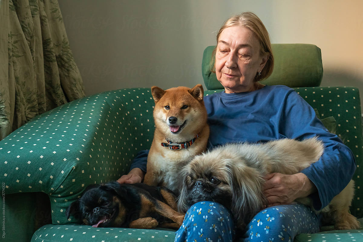 Senior woman with dogs
