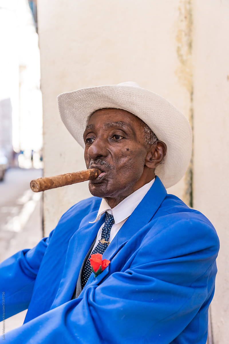 Vintage Looking Man Smoking Big Cigarette