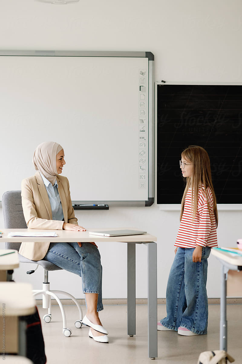 Educational Exchange: Teacher in Hijab and Student Interaction