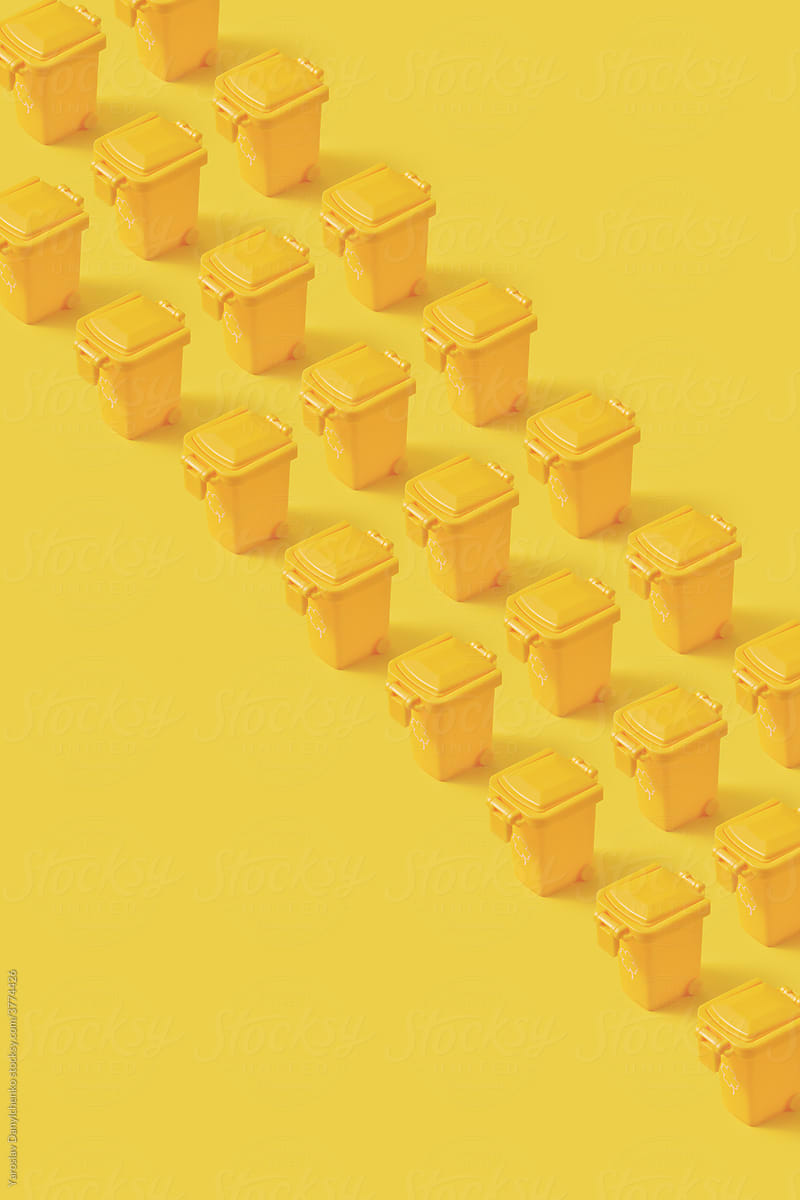 Rows of small yellow trash can