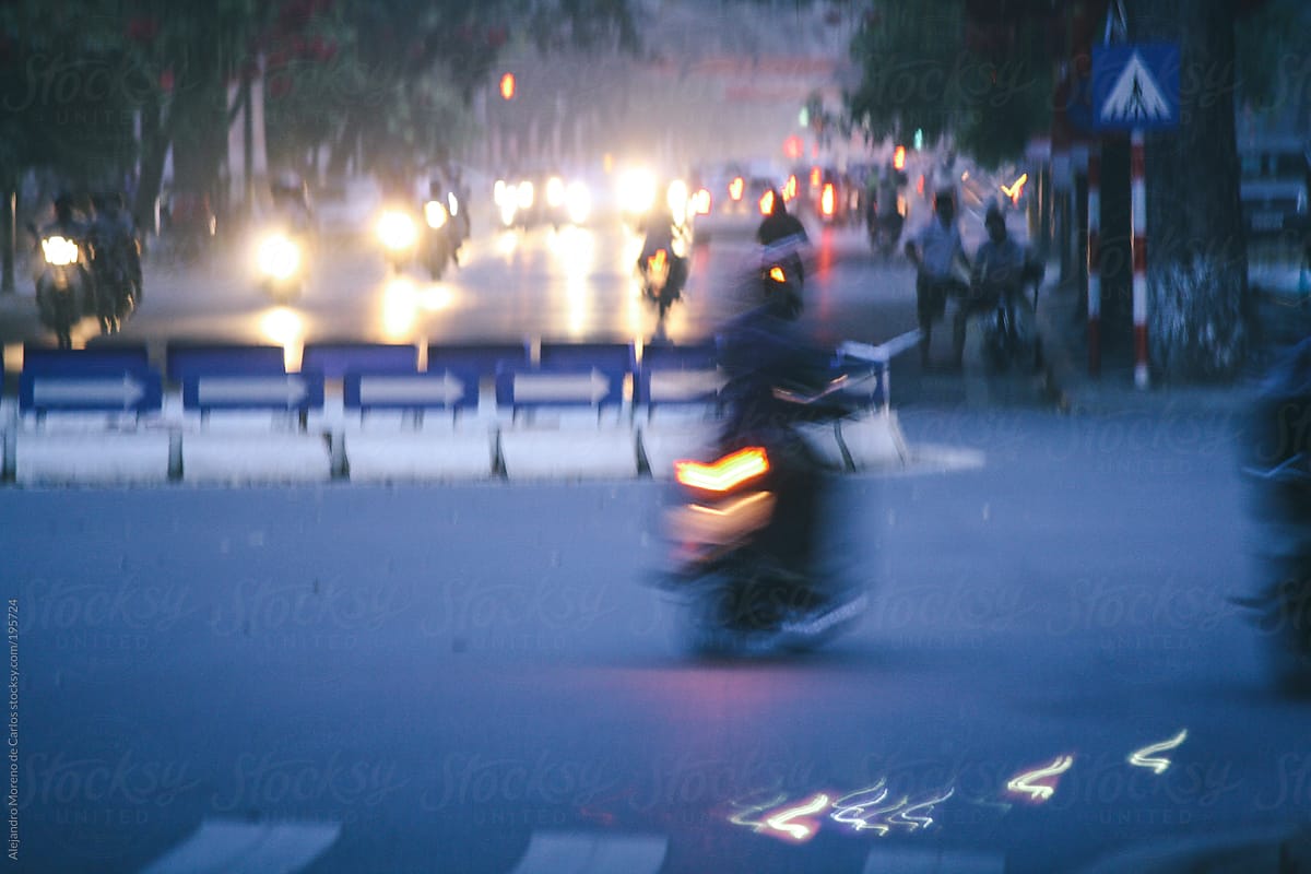 Moped city traffic at night