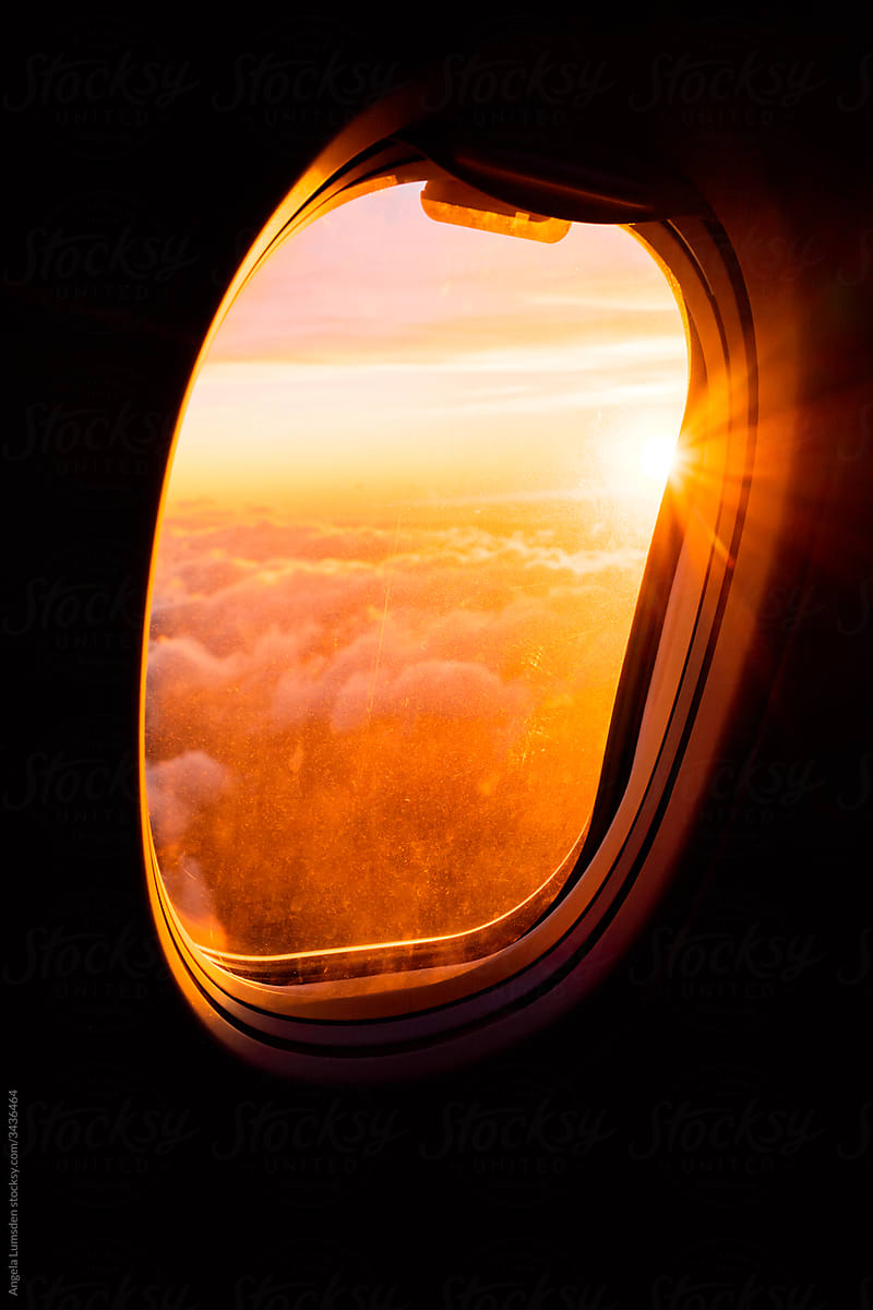 Sunrise through an airplane window