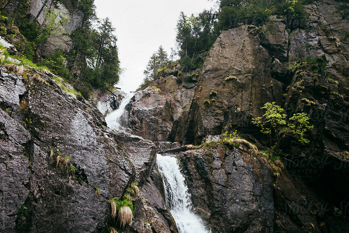 Mountain wilderness with waterfall