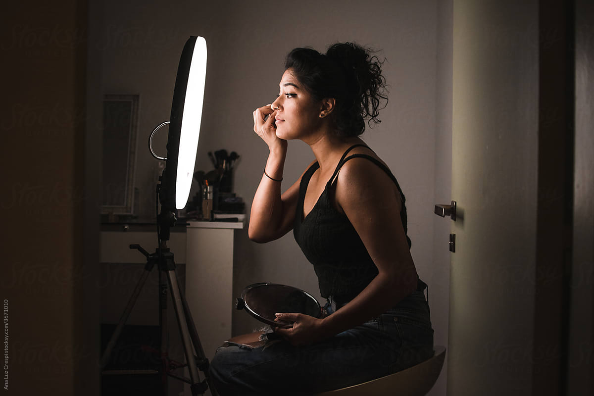 Woman with a ring light