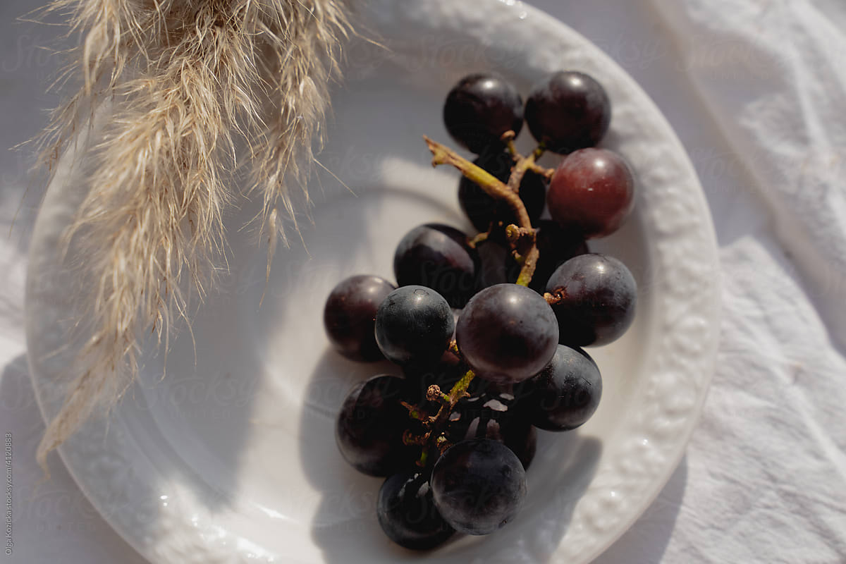 Grapes On Coffee Saucer And Pampas Grass