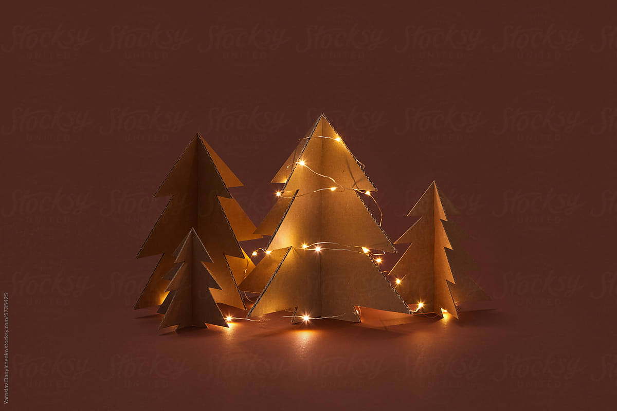 Decorative Christmas trees made of decorated with glowing garland