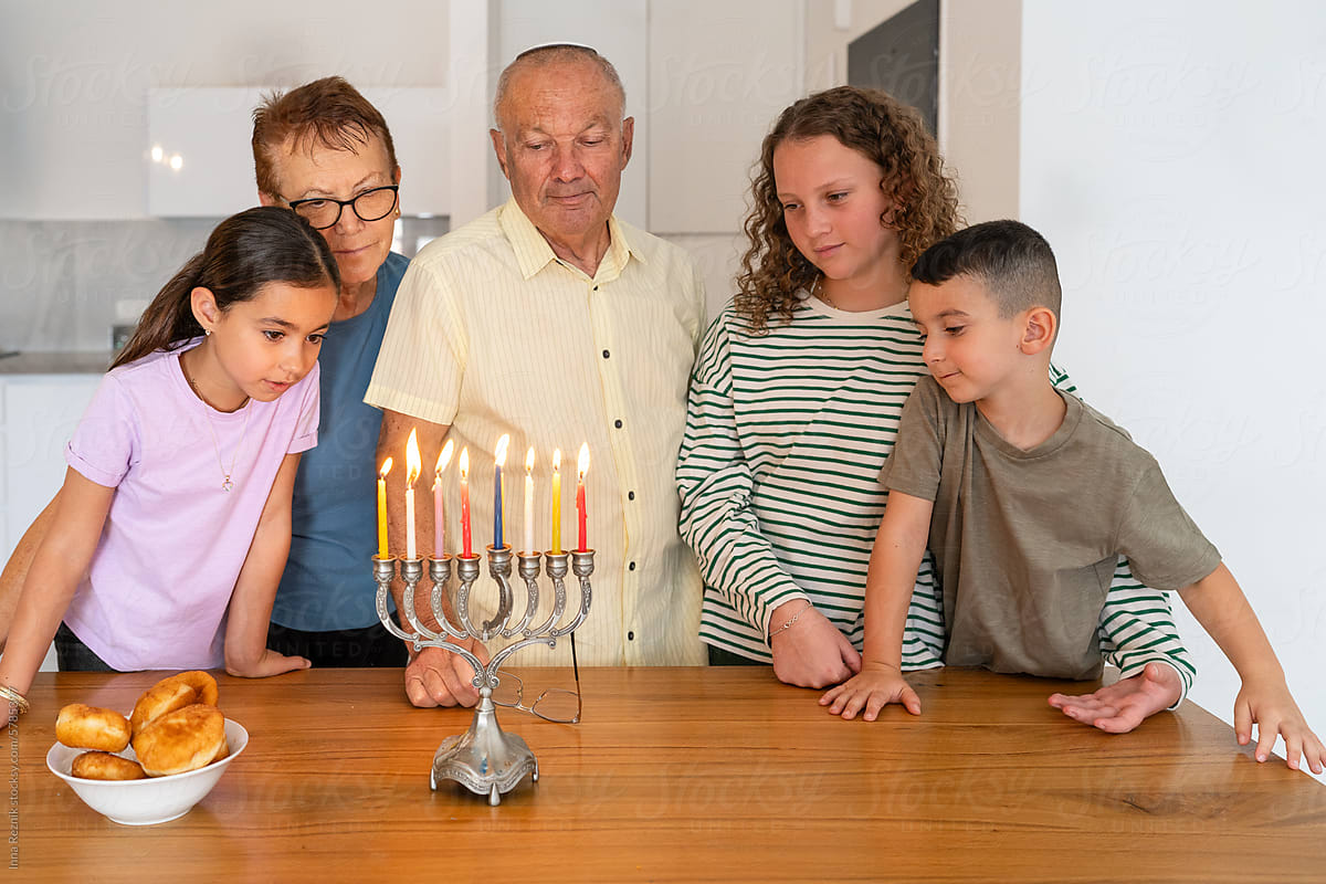 Jewish Family Celebrates Hanukkah at Home.