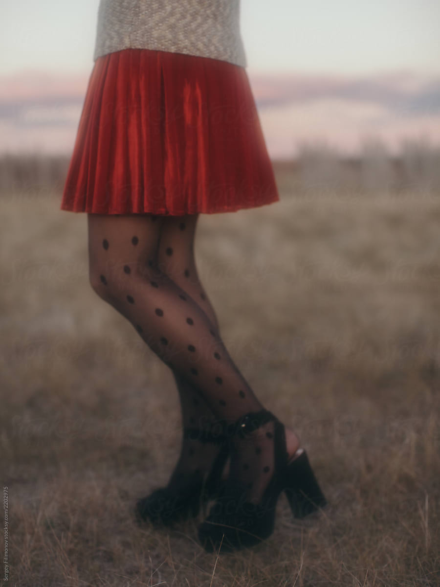 Woman in vintage skirt and tights