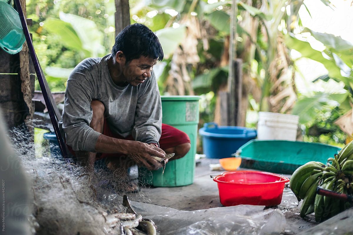 Man preparing fresh fish