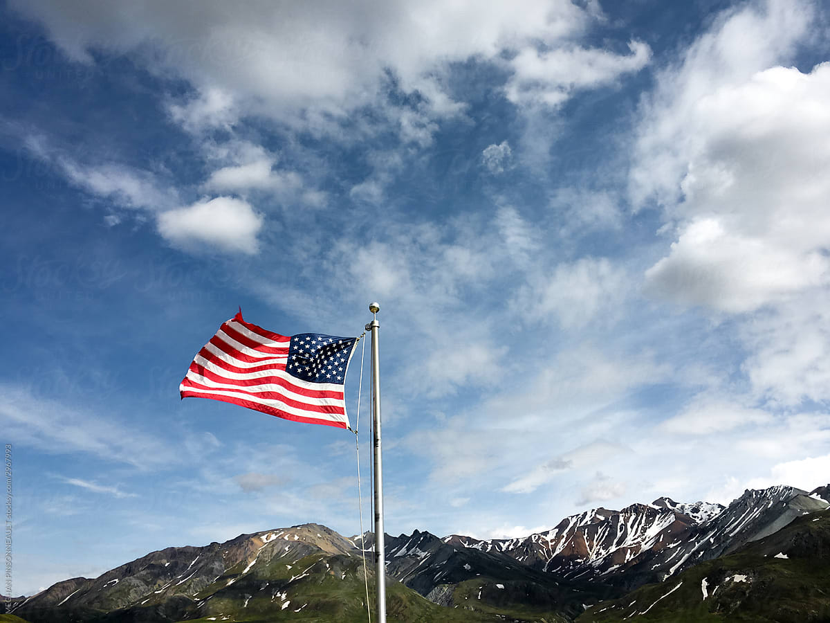 American Flag with Snowy Mountain Background