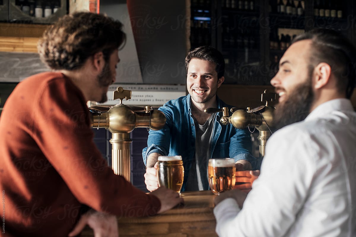 Men Drinking Beer at Pub