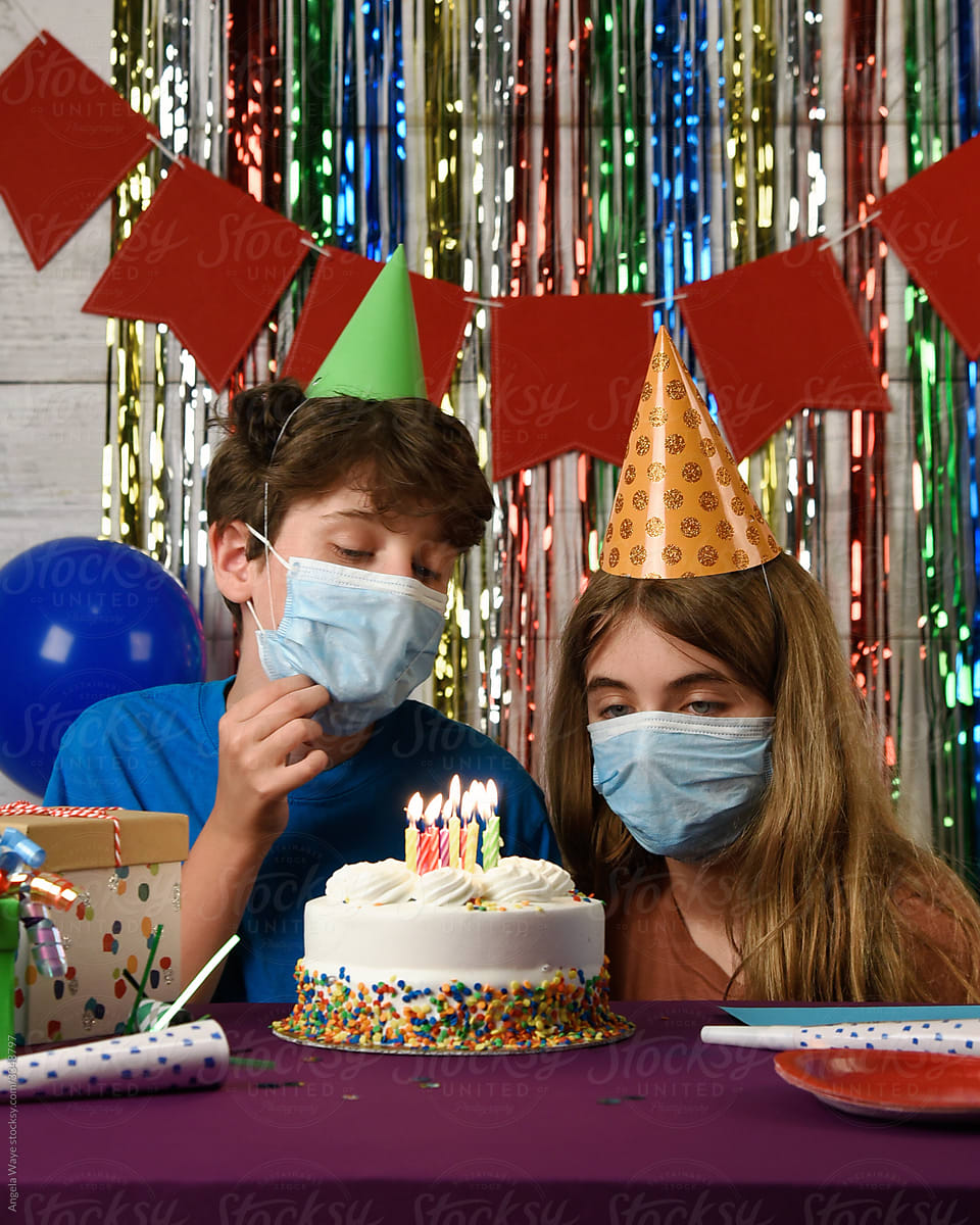 Children in Masks at Birthday