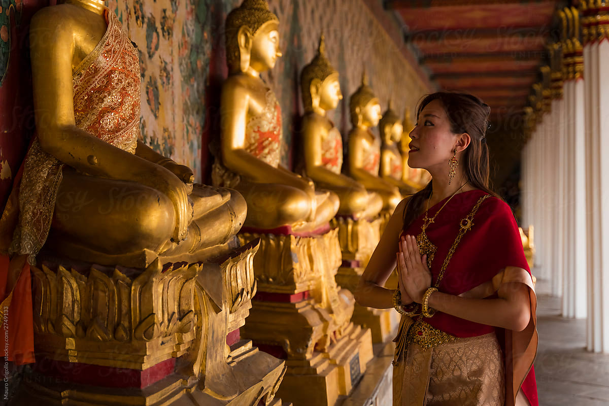 Asian woman praying Buddha