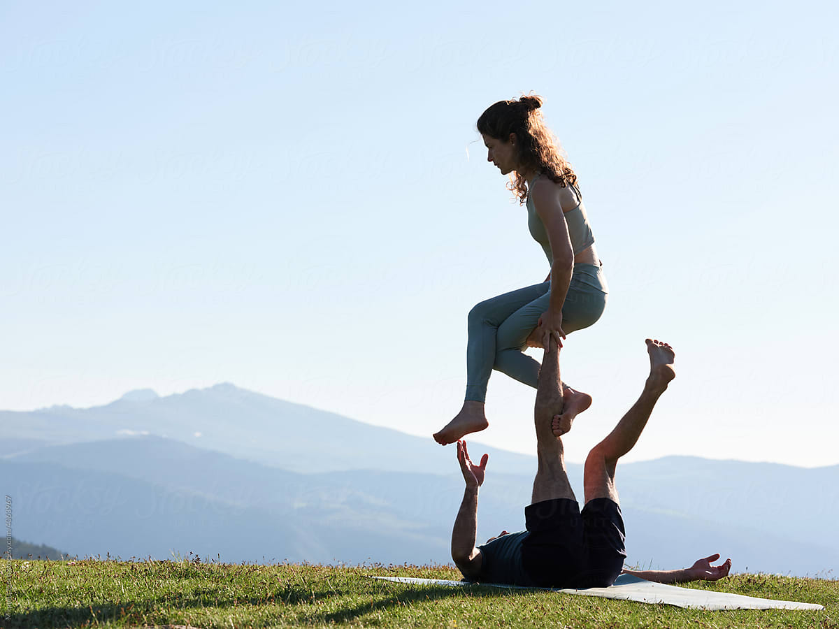 Acro yoga session of couple