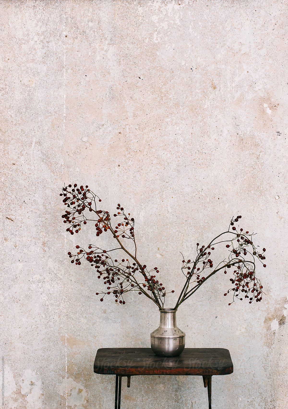 Home Decoration - Japanese Flower Arrangement in Front of Shabby Wall