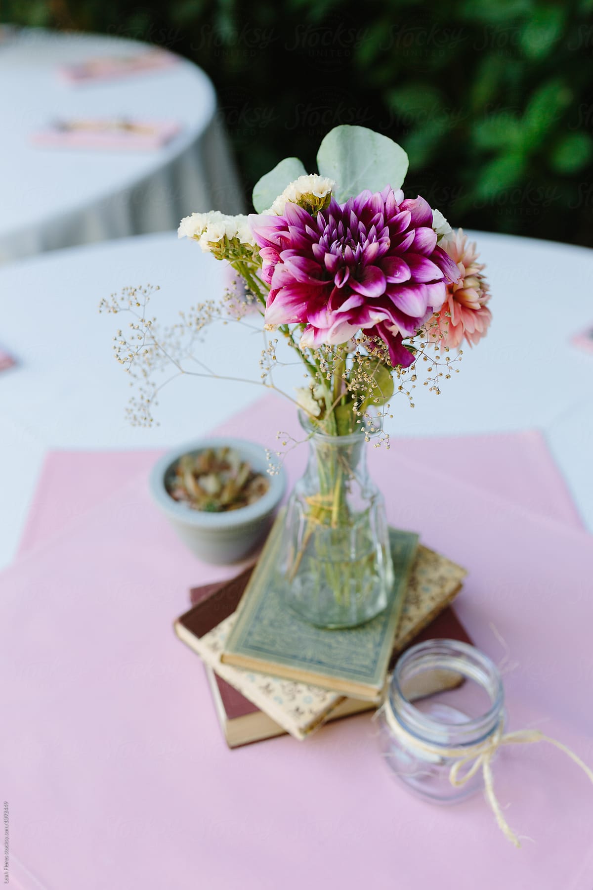Cute Arrangement of Decorations on an Outdoor Wedding Dining Table