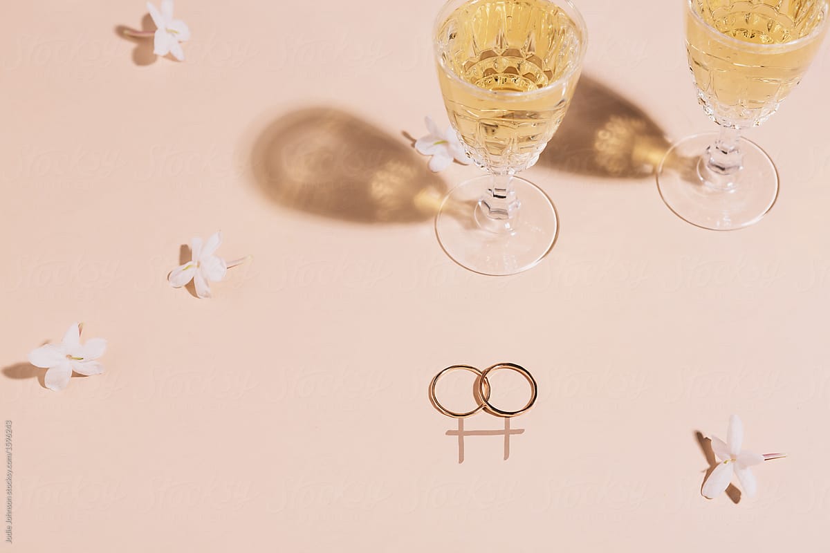 Two wedding rings on a background with graphic symbolising gay marriage