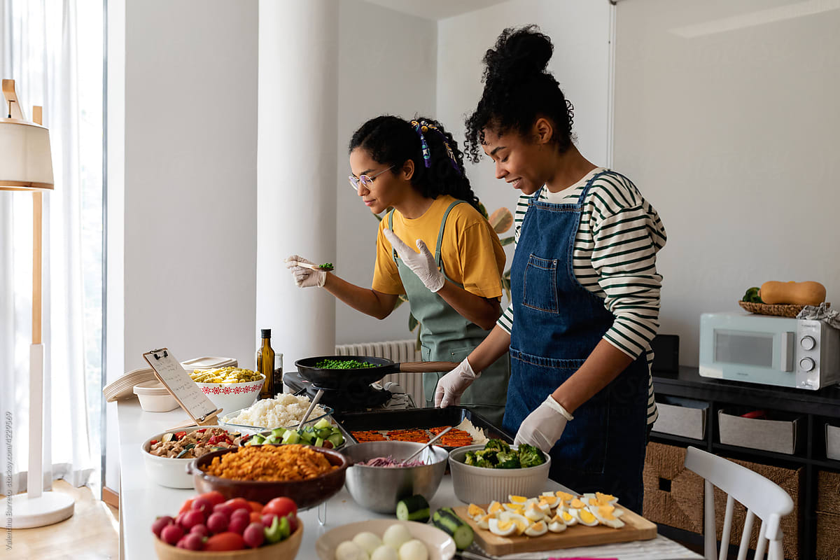 Latin women cooking together
