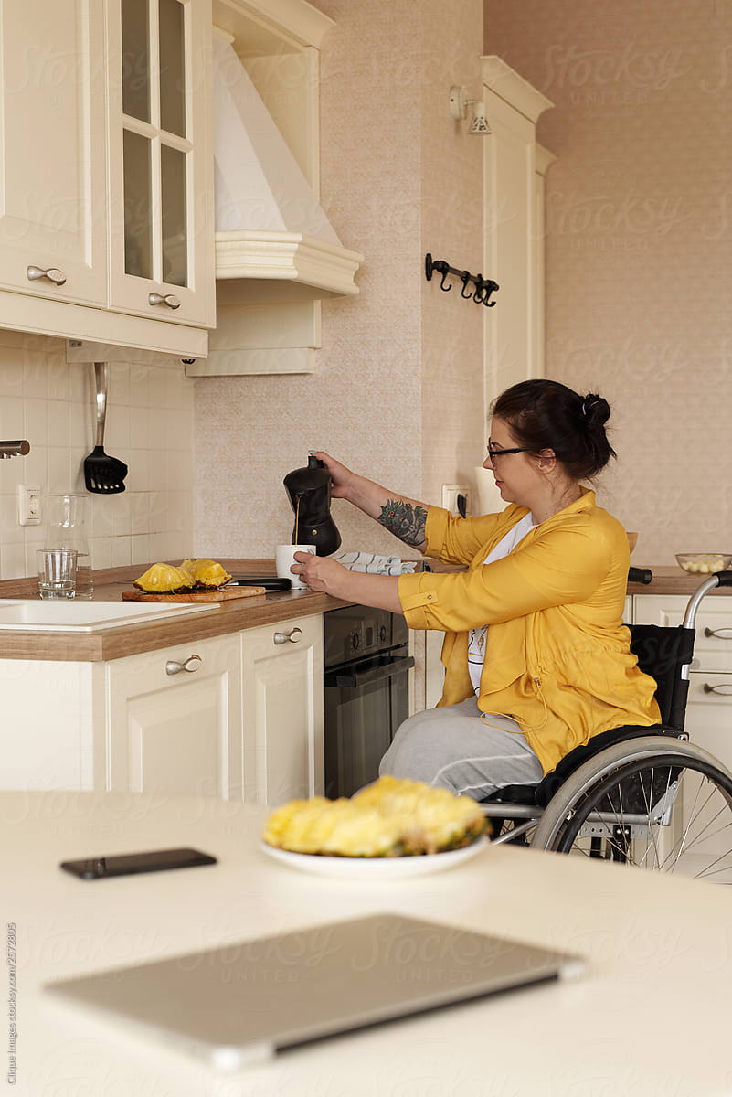 Disabled Woman Pouring Coffee