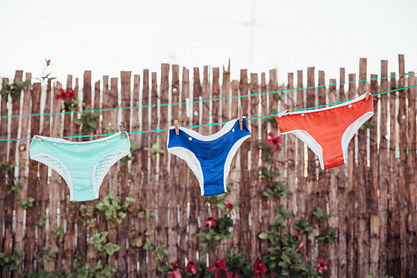 Female Panties Hanging On Clothesline by Stocksy Contributor