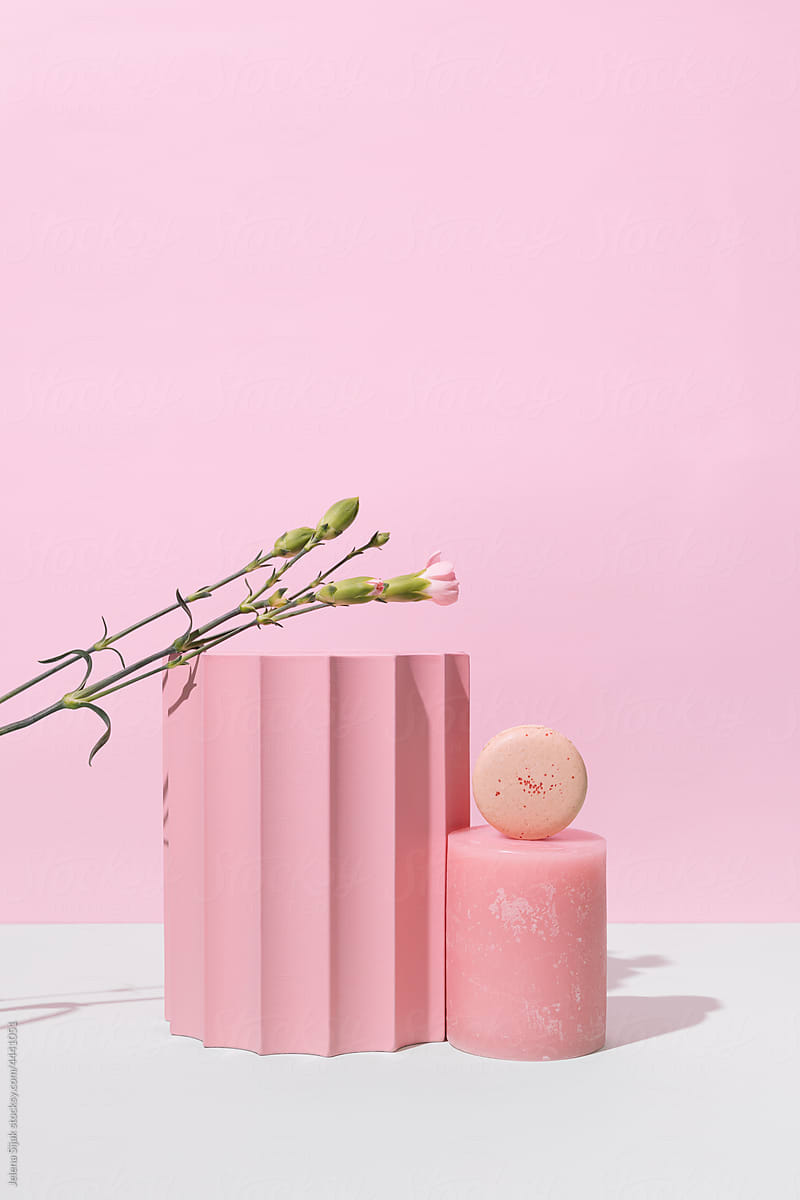 One french macaroon or macaron in peachy pastel color.