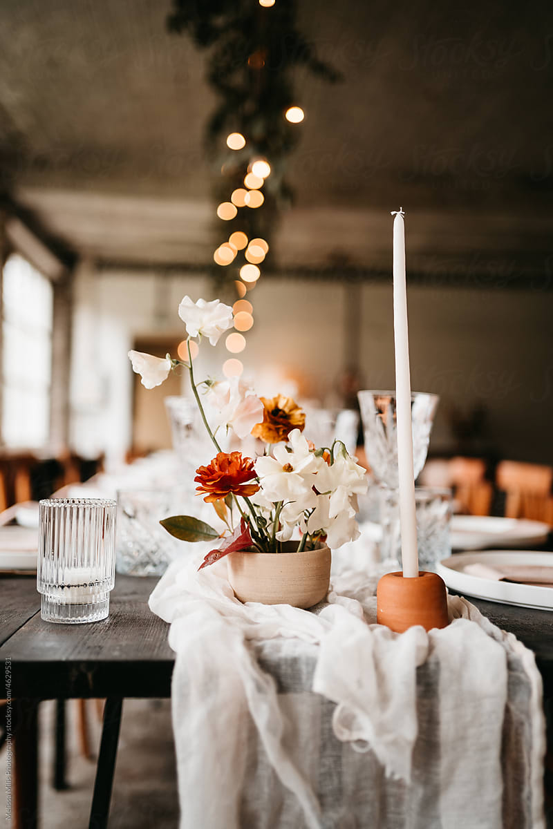 Floral arrangement on a rustic table indoors