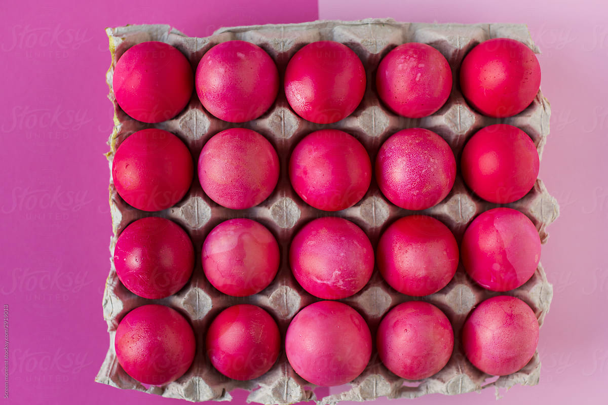 Pink Easter eggs on pink background in the package C