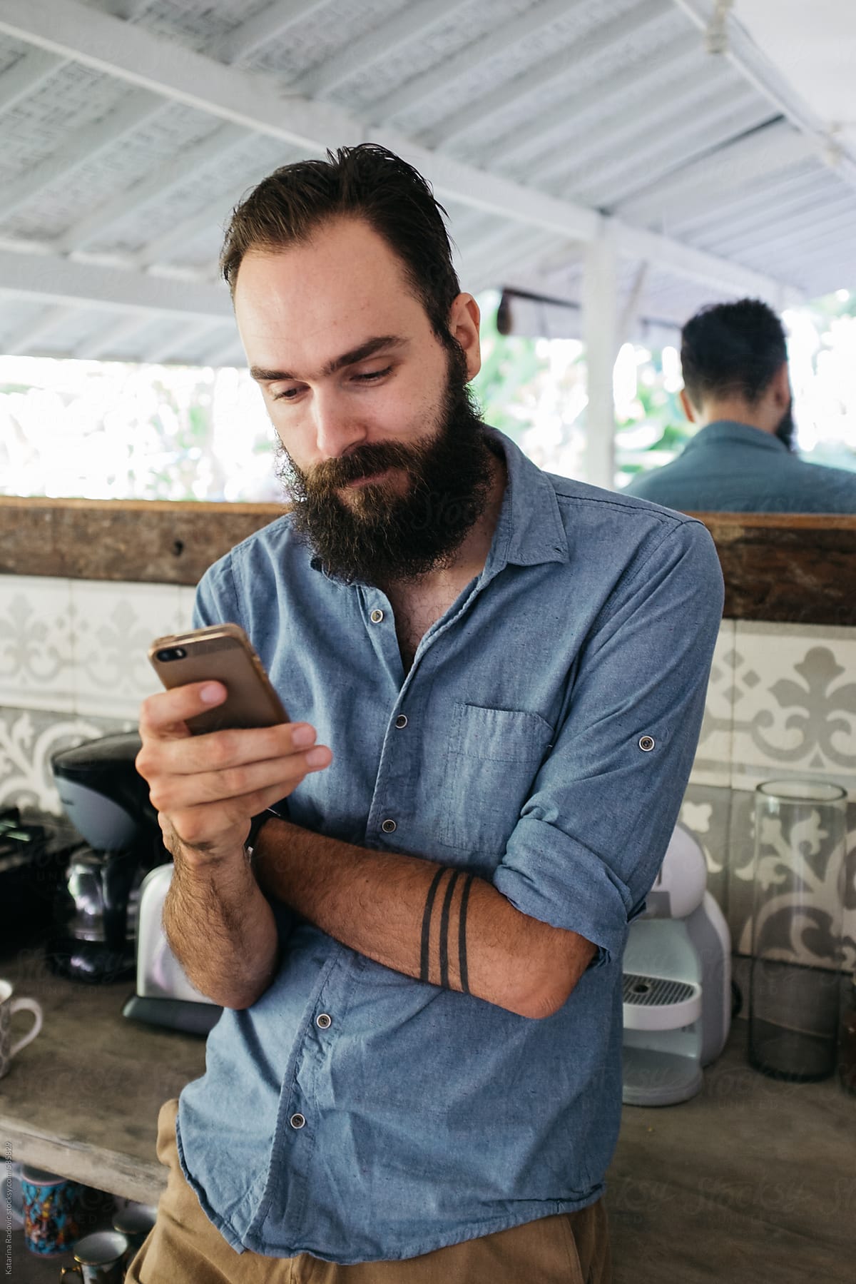Handsome Bearded Man Using Phone