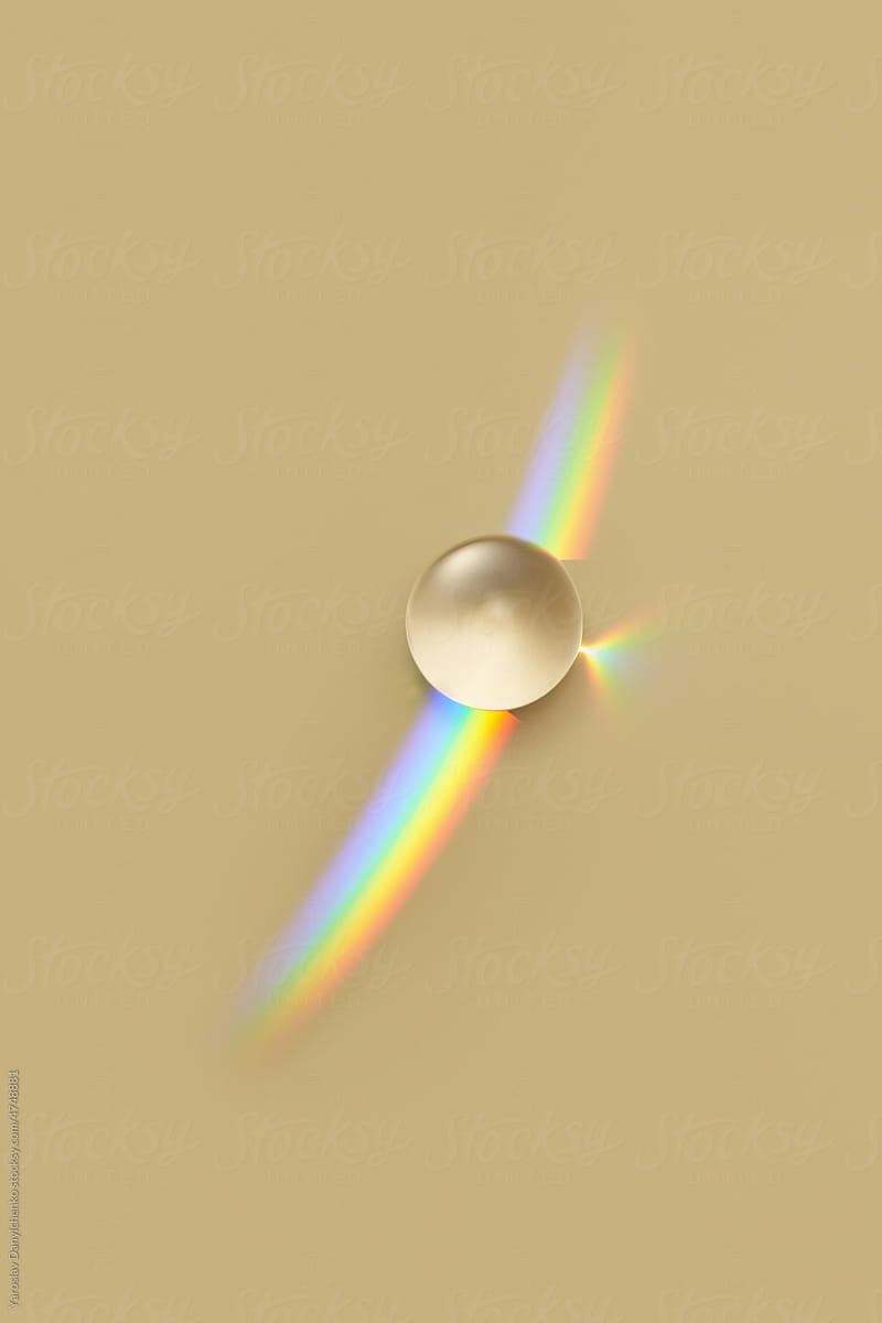 Glass globe on prism rainbow.