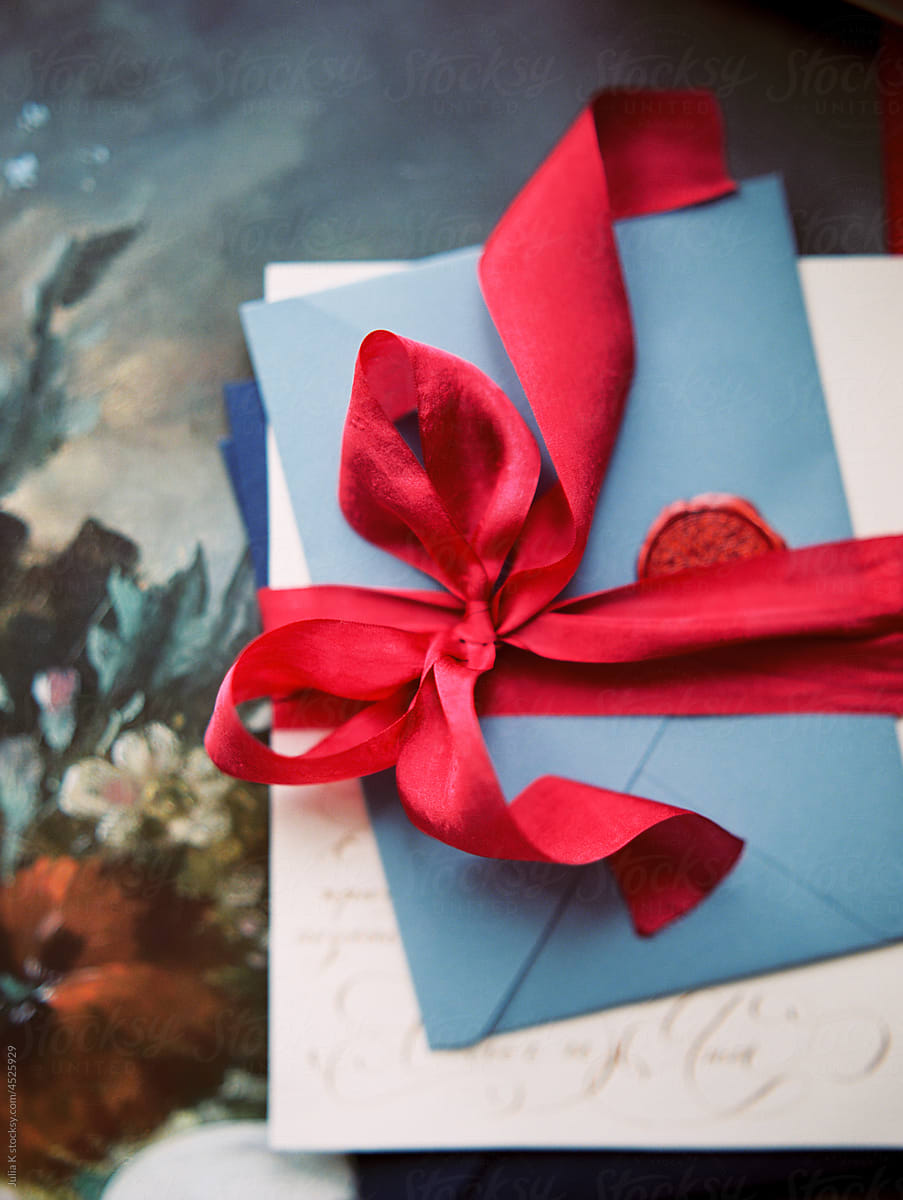 Blue Envelope With Red Ribbon