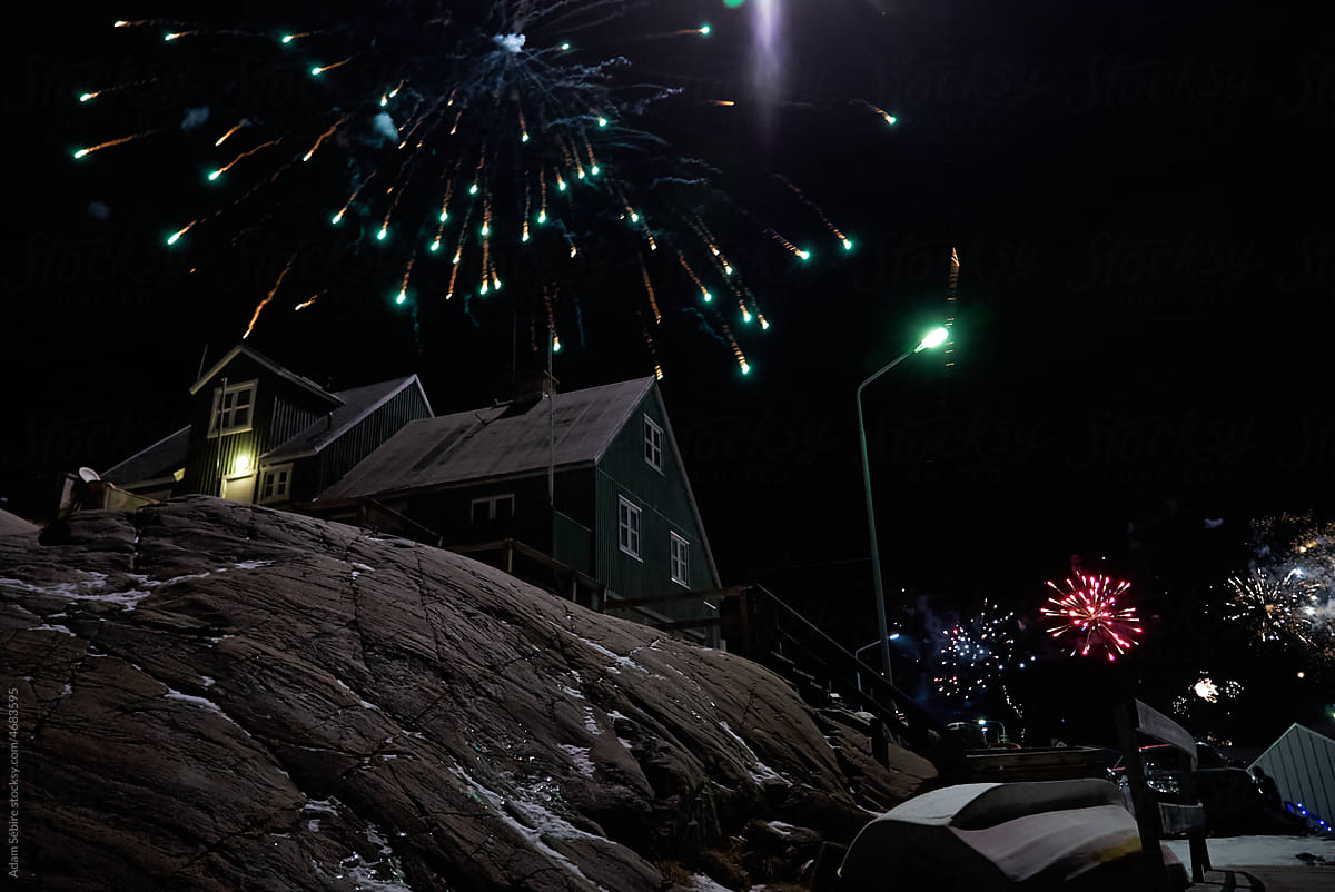 New year\'s eve street fireworks at Uummannaq, Greenland, polar night
