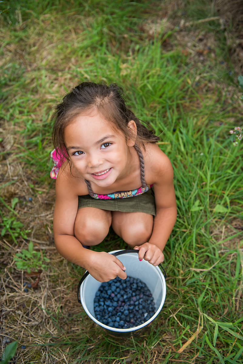 Little Girl With Blueberry Haul