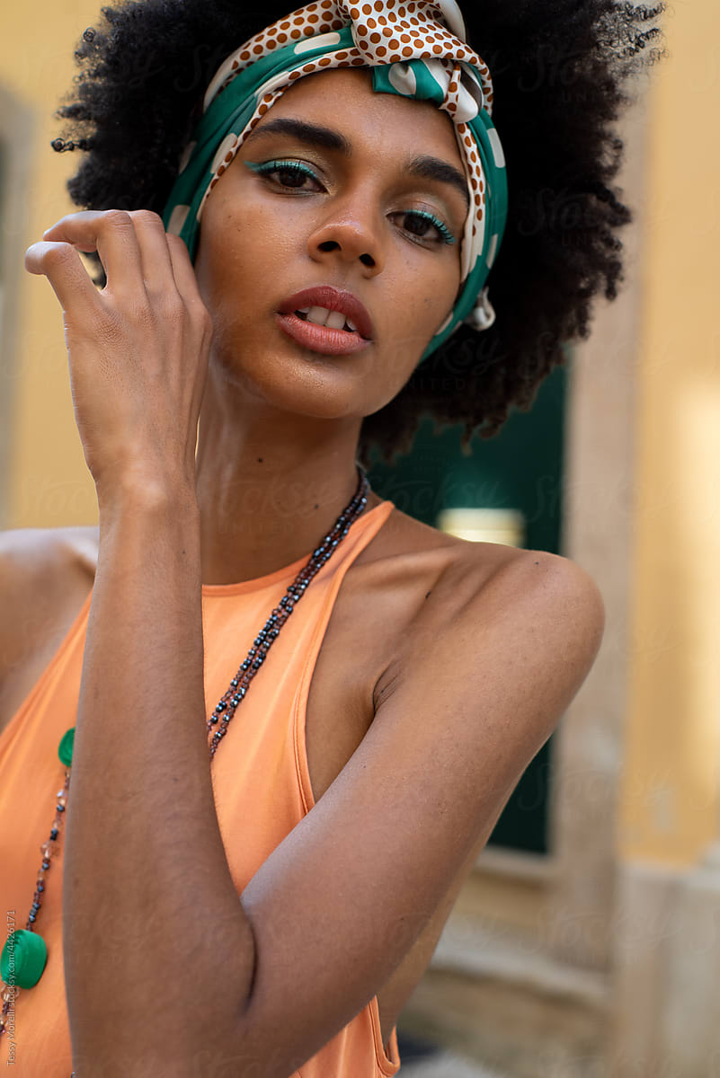 Urban outdoor fashion portrait of an African millennial