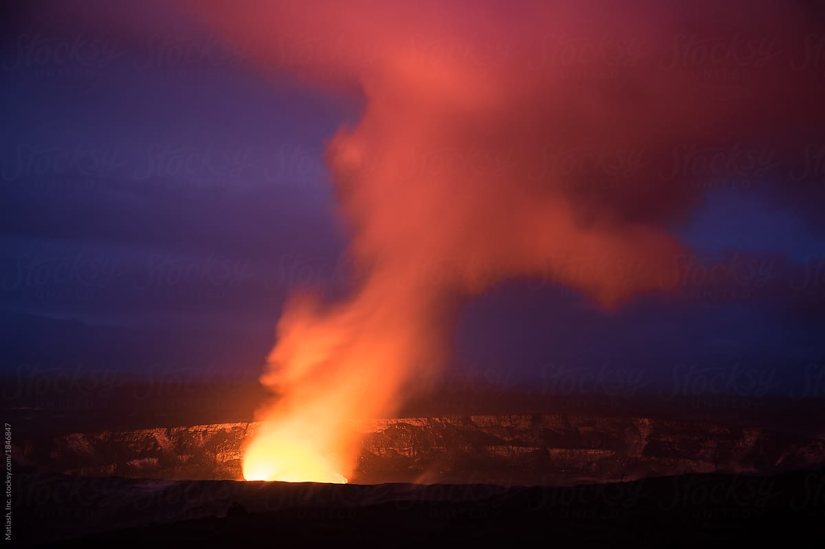 Lava glowing within a volcano caldera