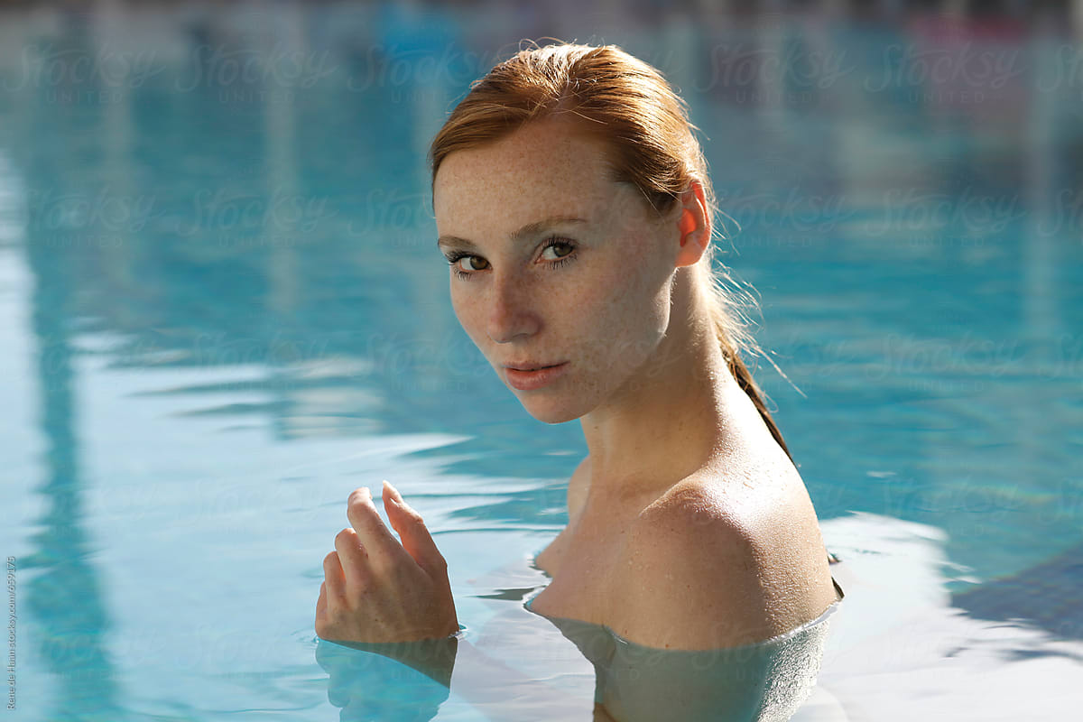 Young Woman In Swimming Pool By Stocksy Contributor Rene De Haan