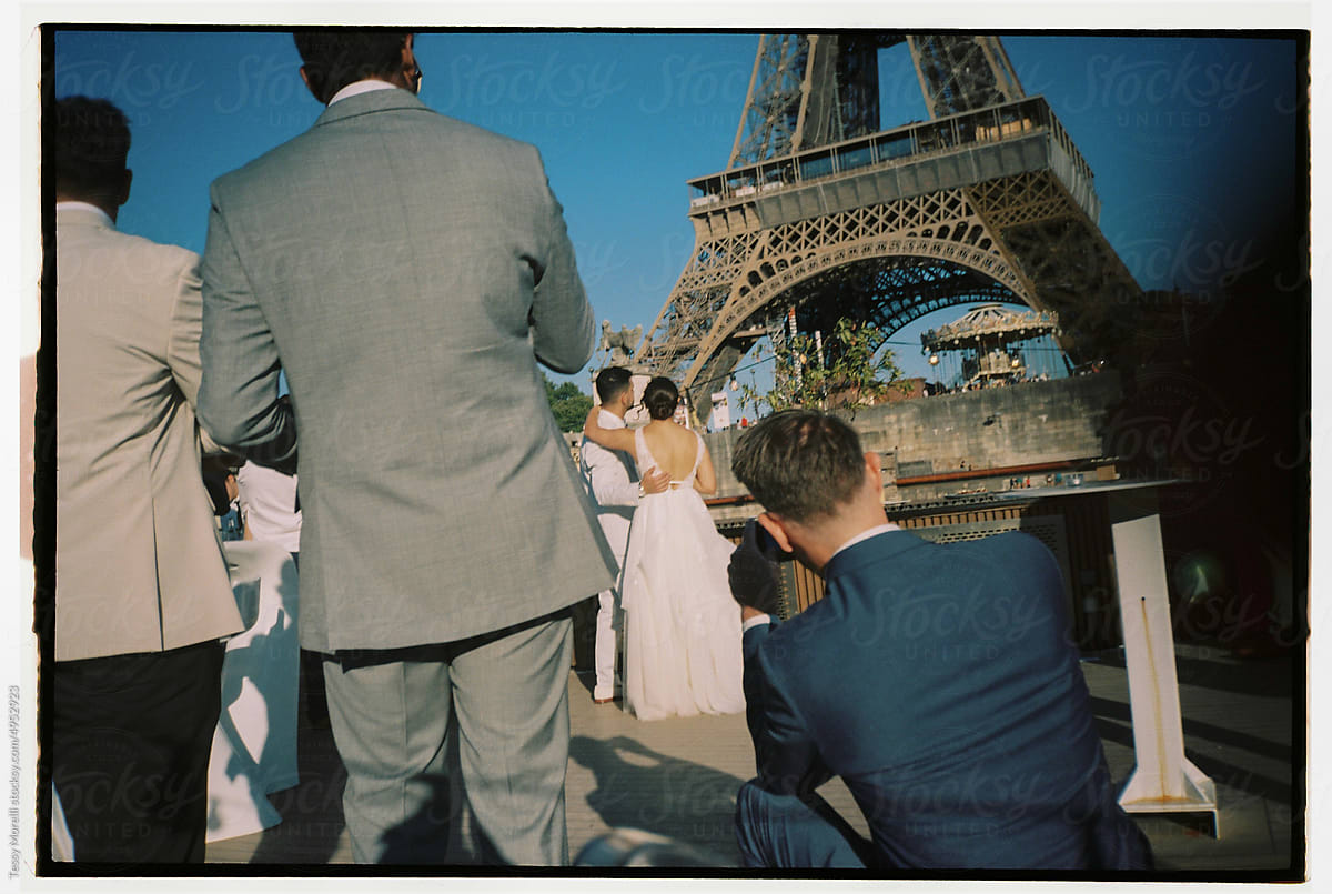 Married couple wedding hugging Paris Eiffel Tower