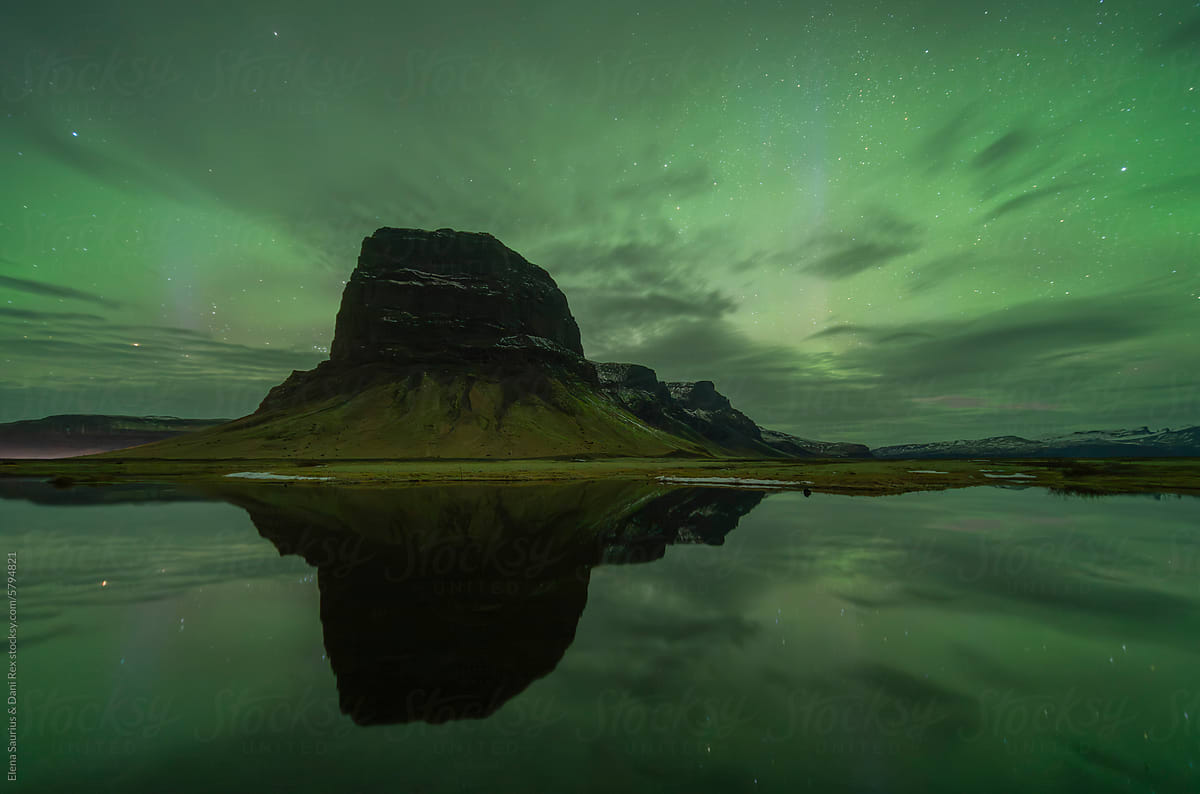 Aurora Borealis over mountains in Iceland