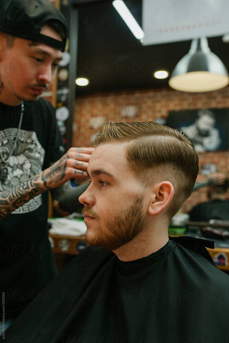 A ginger-haired guy in the barbershop