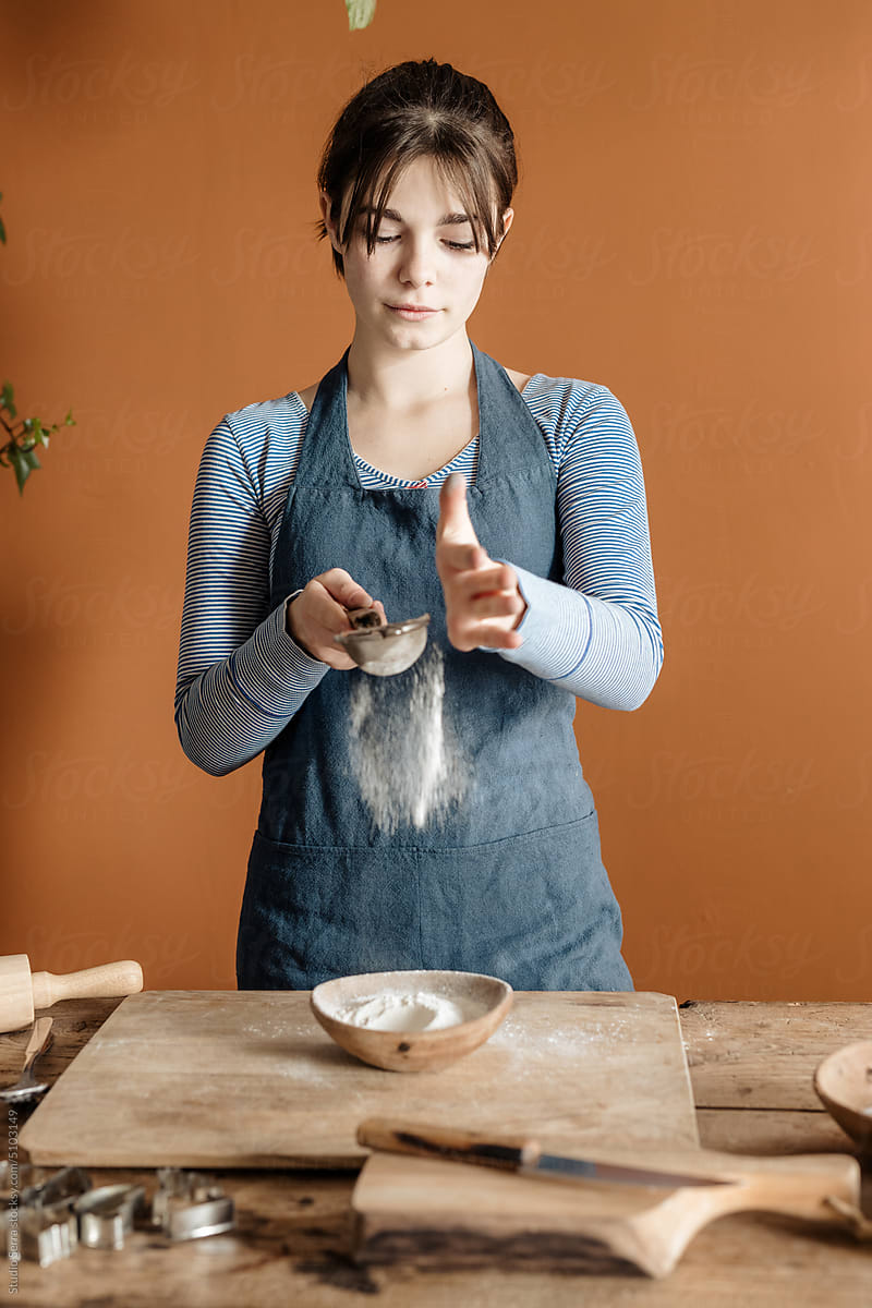 Girl Sifting Flour