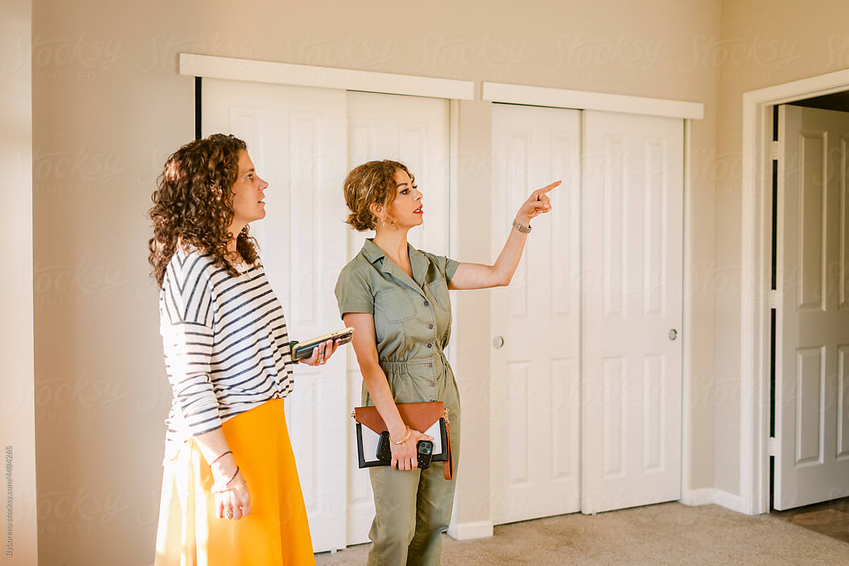 Woman visiting house for sale