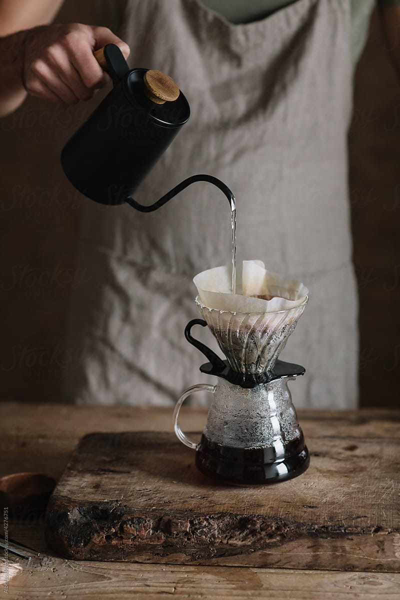 Man Pouring Hot Water To Brew Artisanal Coffee