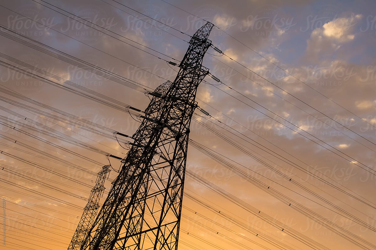 High voltage tower in city at dusk,Beijing