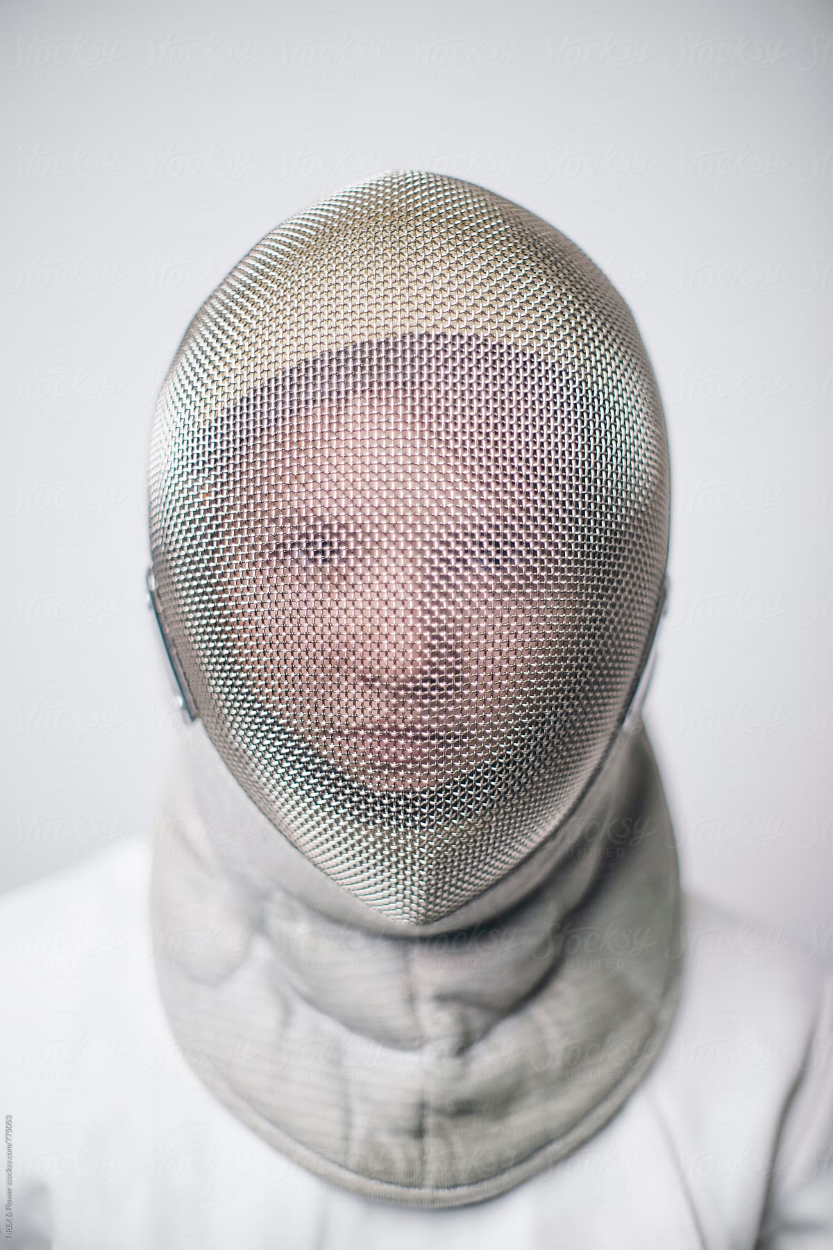 Close-up of female fencer in mask