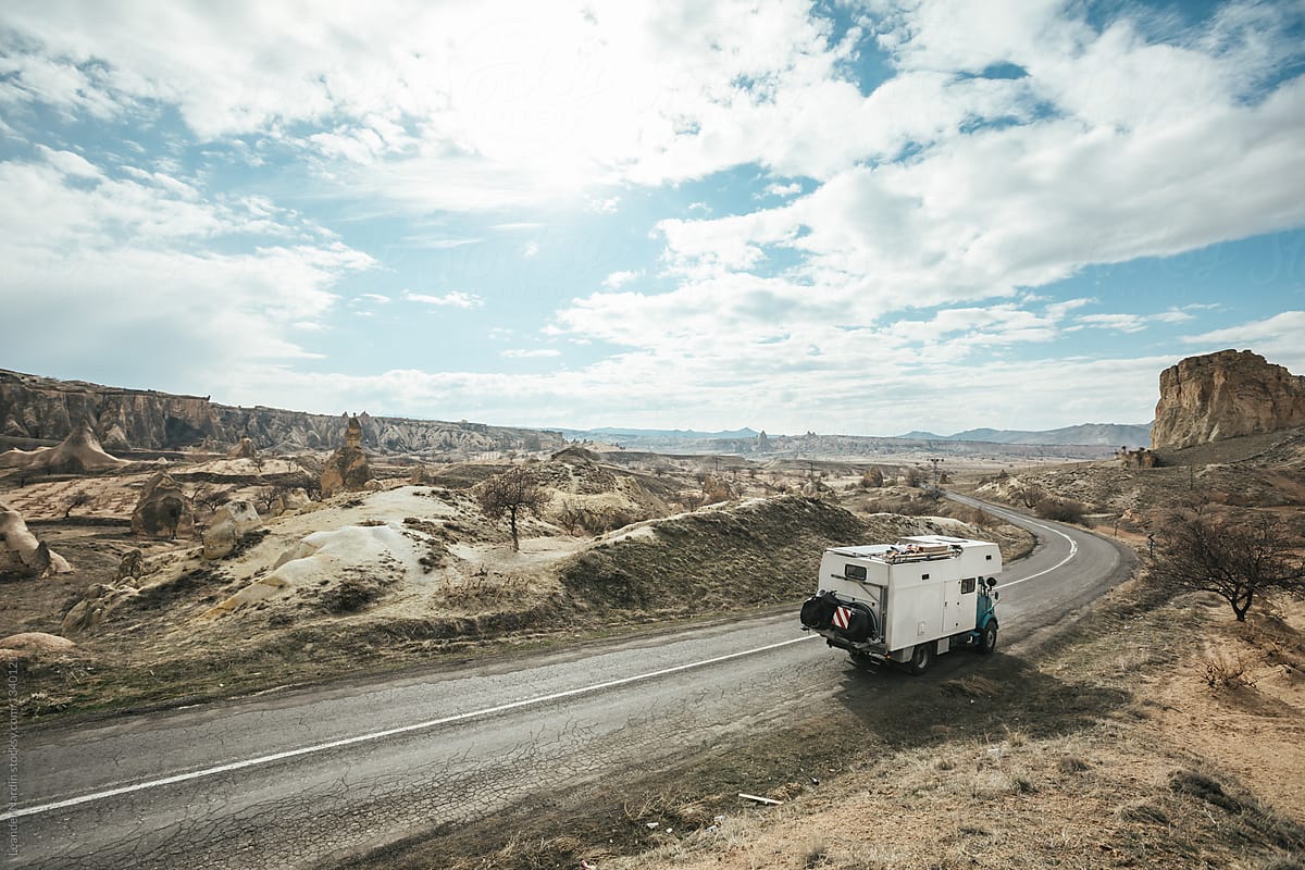 camping truck on a road leading through cappadocia, turkey